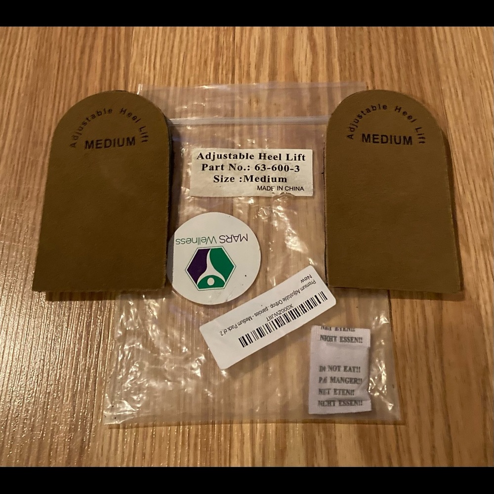 NWT adjustable heel lift